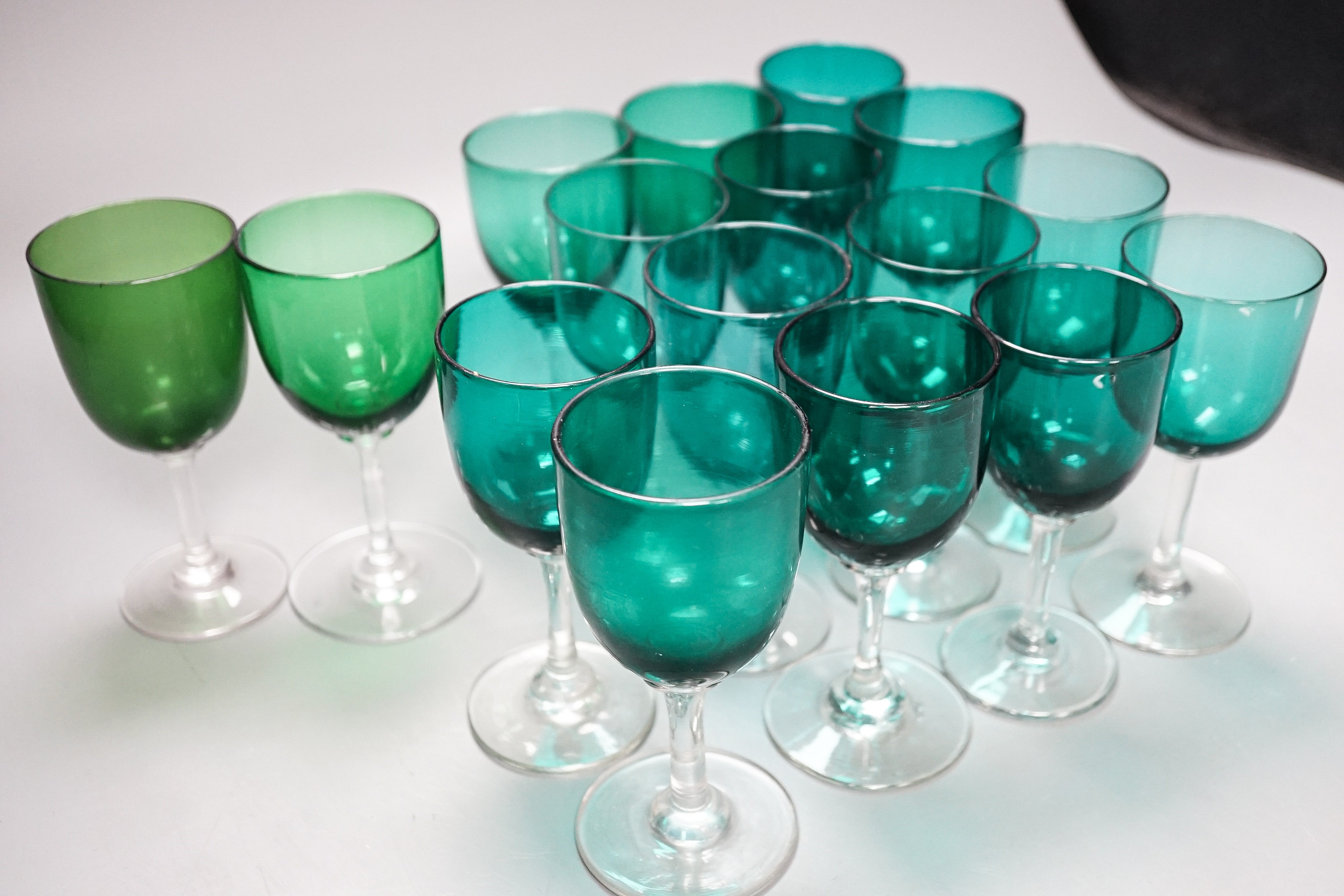 A sixteen green wine glasses, 19th/20th century